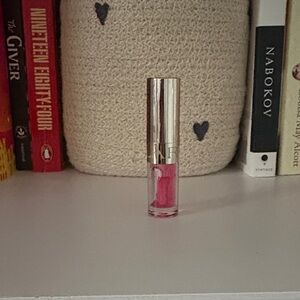 3/$30 brand new mini size clarins lip oil in 04